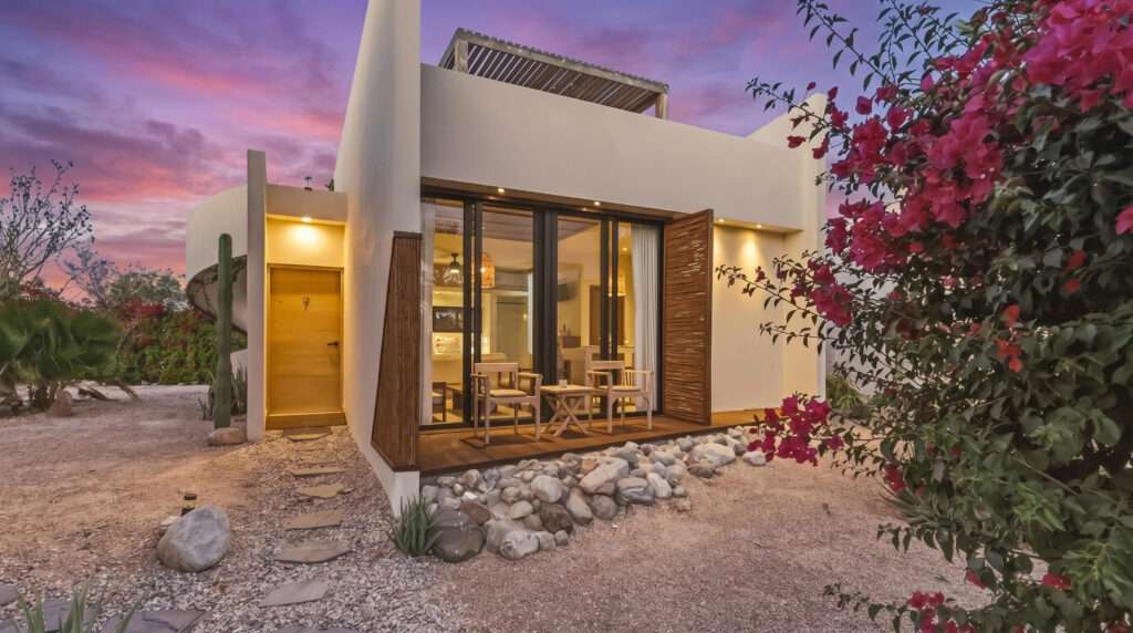 Cabo del Sol El Posito We are excited to introduce Casa Elisabeth, an amazing, newly constructed custom home in the private El Posito area of Todos Santos. Located just three rows back from the beach, this three-bedroom, three-full and two-half bathroom residence offers every amenity desired for a tropical paradise. The downstairs features an open-concept living room, dining room, and a fully stocked kitchen with brand-new appliances, including a dishwasher. The main floor also includes a laundry room and an outdoor water feature with a professionally designed rock wall. The principal bedroom downstairs offers a unique indoor/outdoor bathroom with two showers and an outdoor bathtub.Each of the three bedrooms includes an en-suite bathroom with double vanities. The upstairs bedroom features its own private furnished terrace and access to one of four large patios, complete with a bar area and outdoor furniture perfect for enjoying ocean sunsets. Additionally, a shaded third-floor observation deck provides panoramic ocean and mountain – Casa Hygge #7, Pacific, Pacific, BS